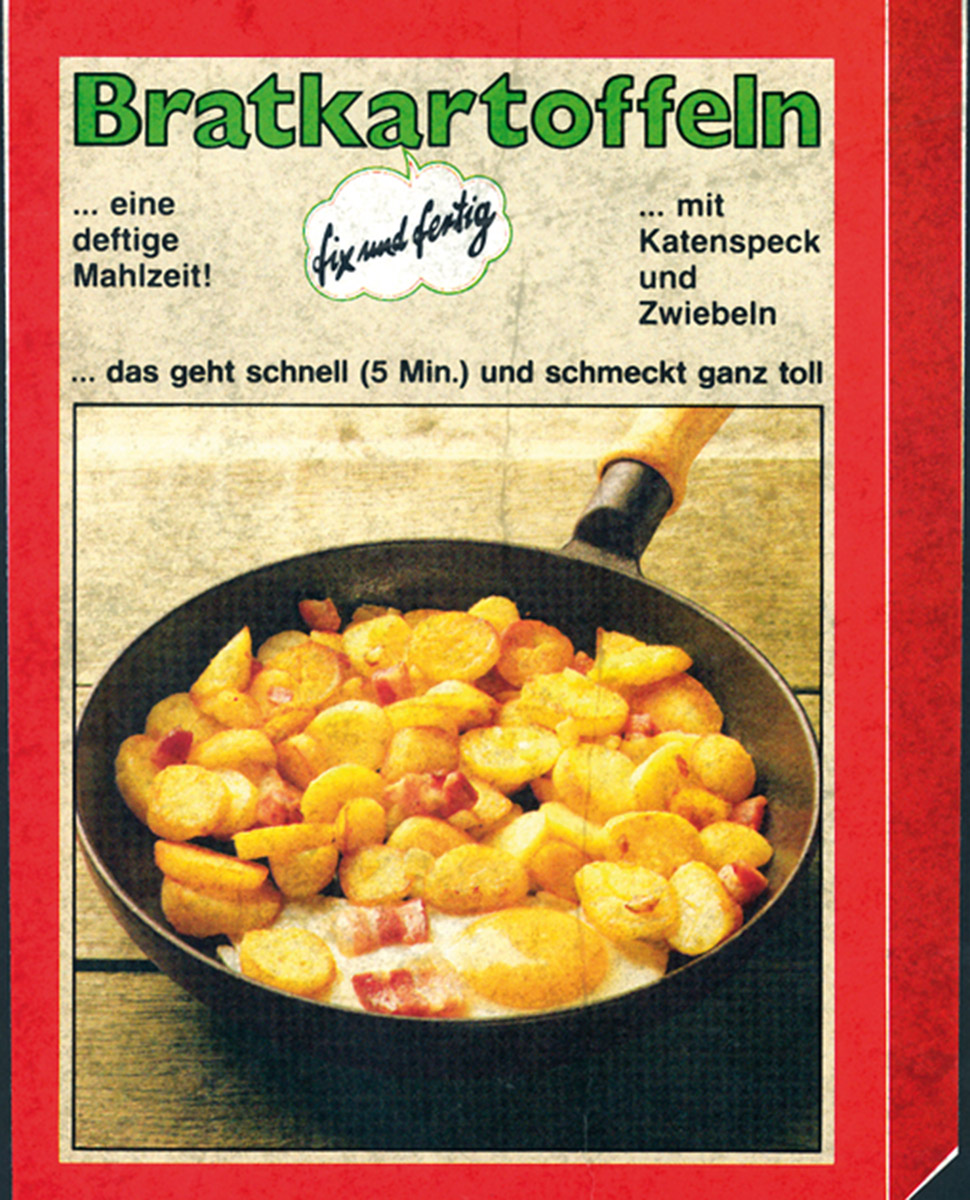 Faltschachtel gefüllt mit Bratkartoffeln 